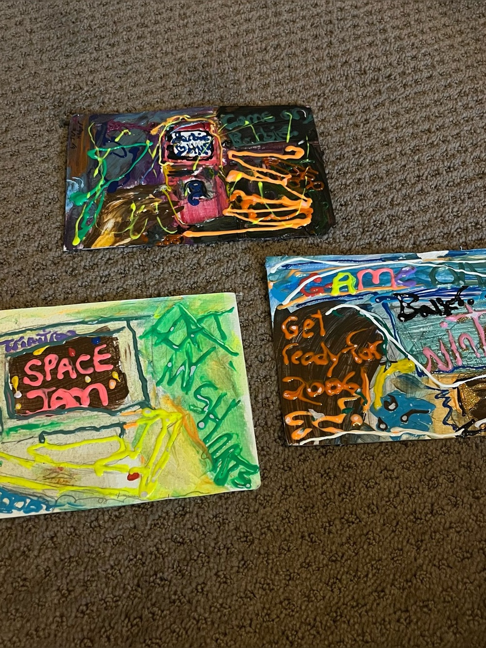 a set of 3 2000s paintings